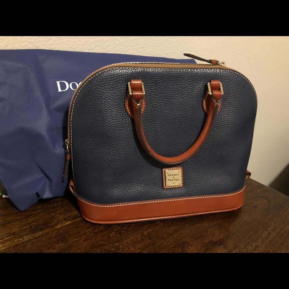 Dooney & Bourke
Pebble grain zip zip satchel 
Midnight blue color